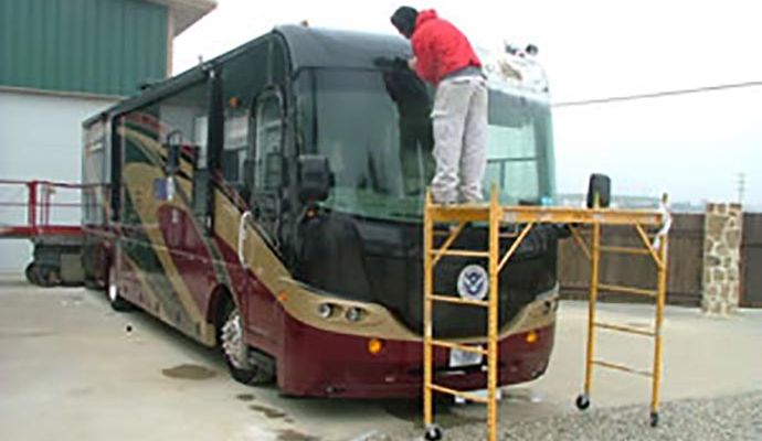 Person repairing rv body