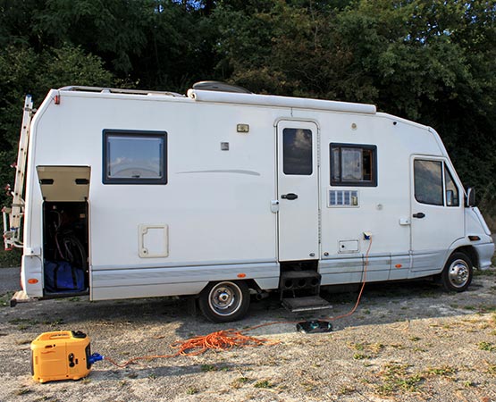 RV van parked for servicing.